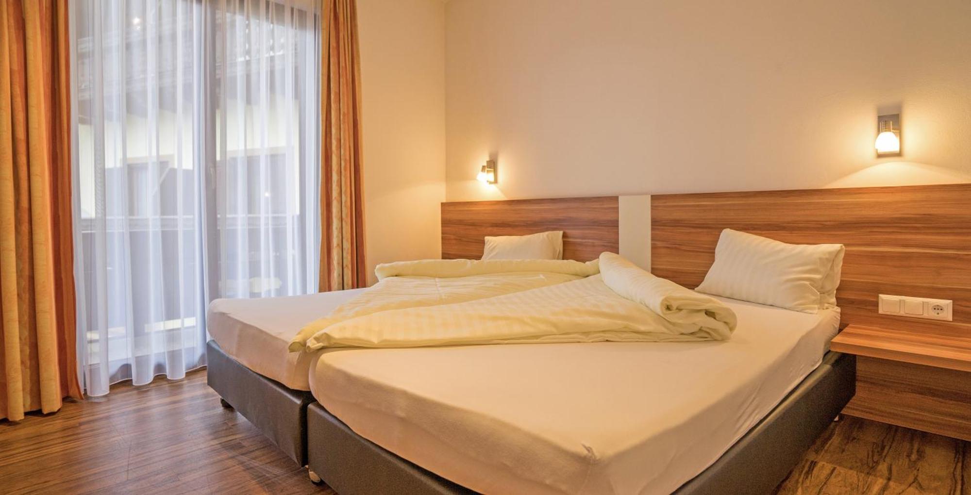 Hotel Haus Stampfer Weissensee Habitación foto