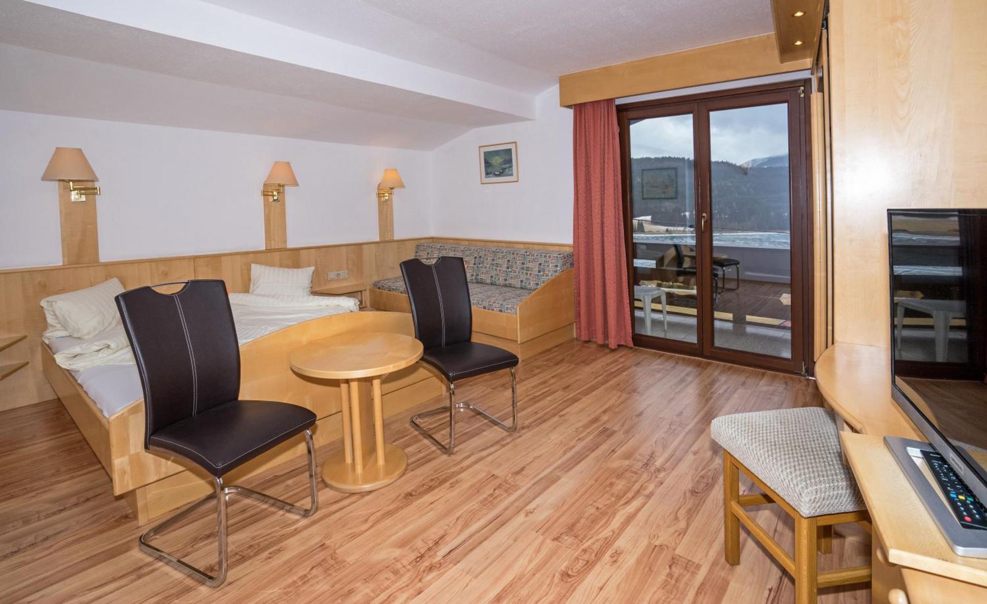 Hotel Haus Stampfer Weissensee Habitación foto